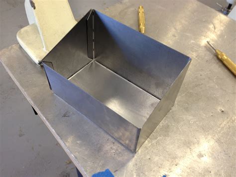 bending a metal box|welding sheet metal boxes.